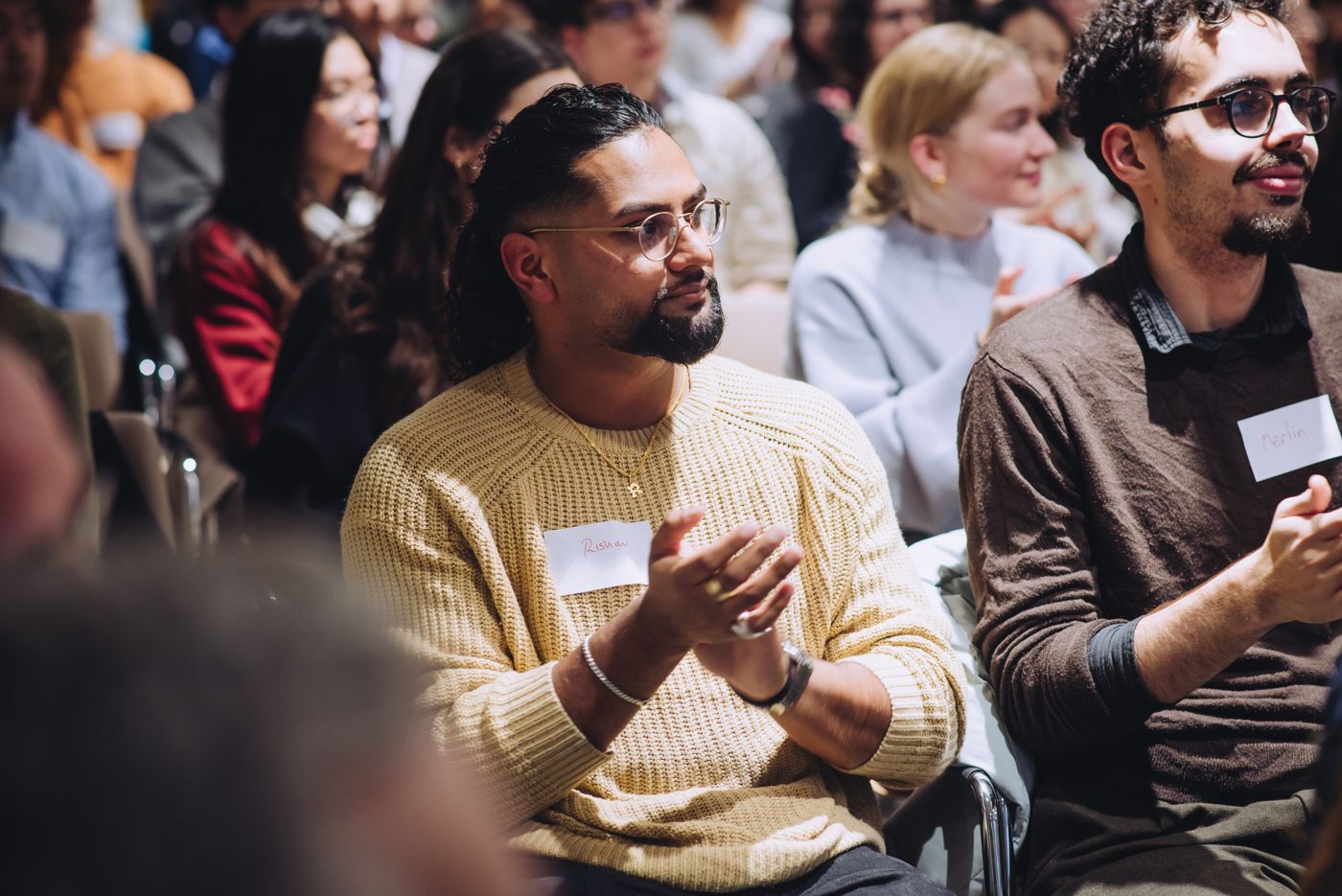 Rishan in the audience at a Bio-Spark event